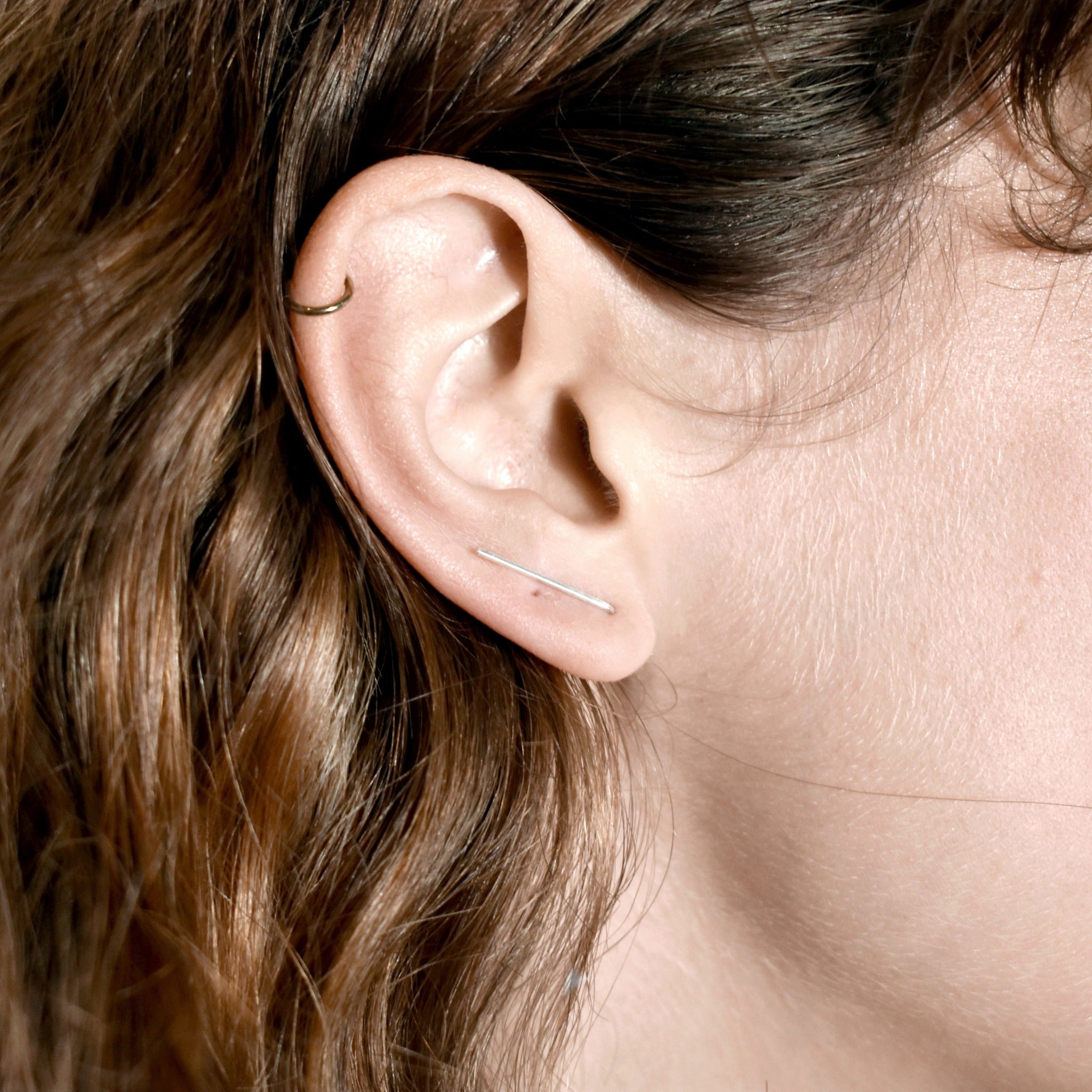 model wearing climber ear bar