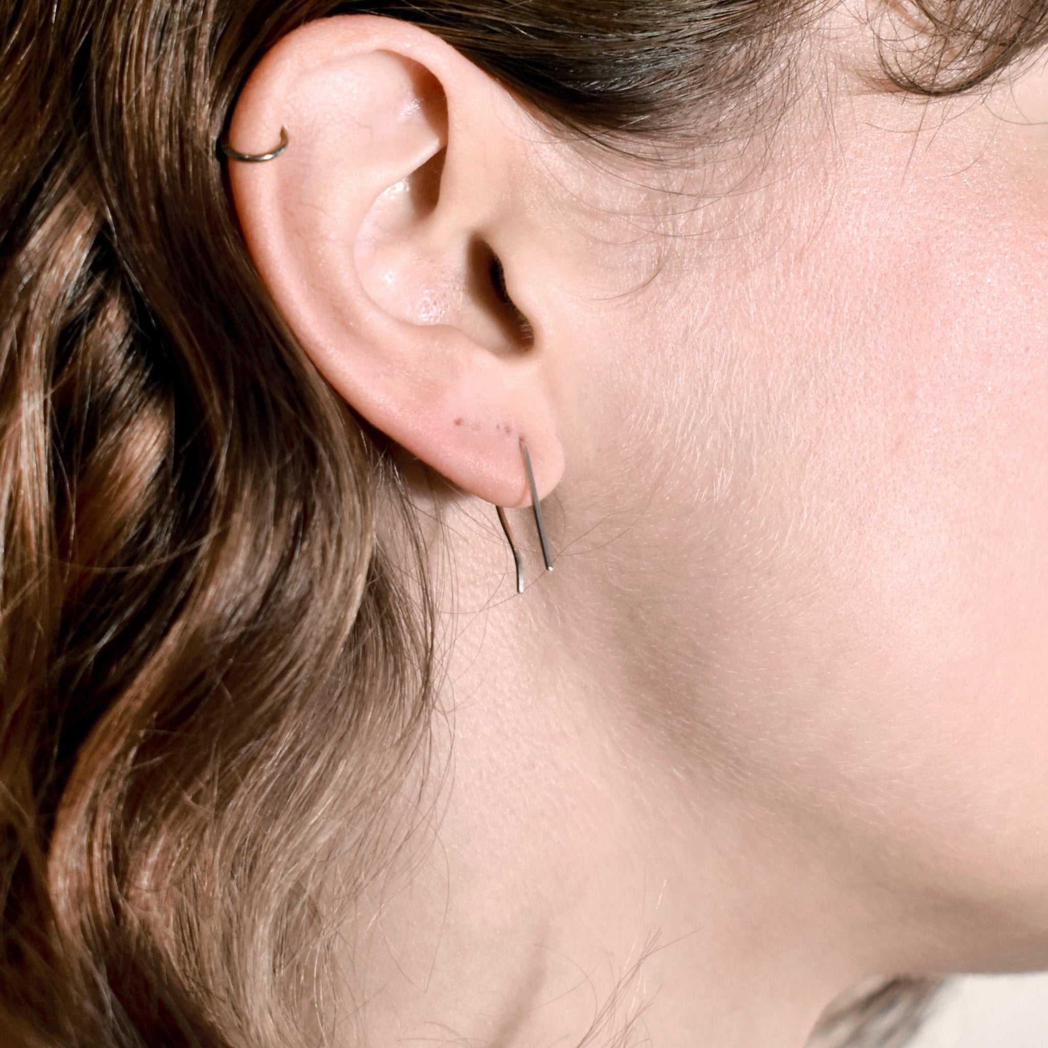 model wearing ear bar