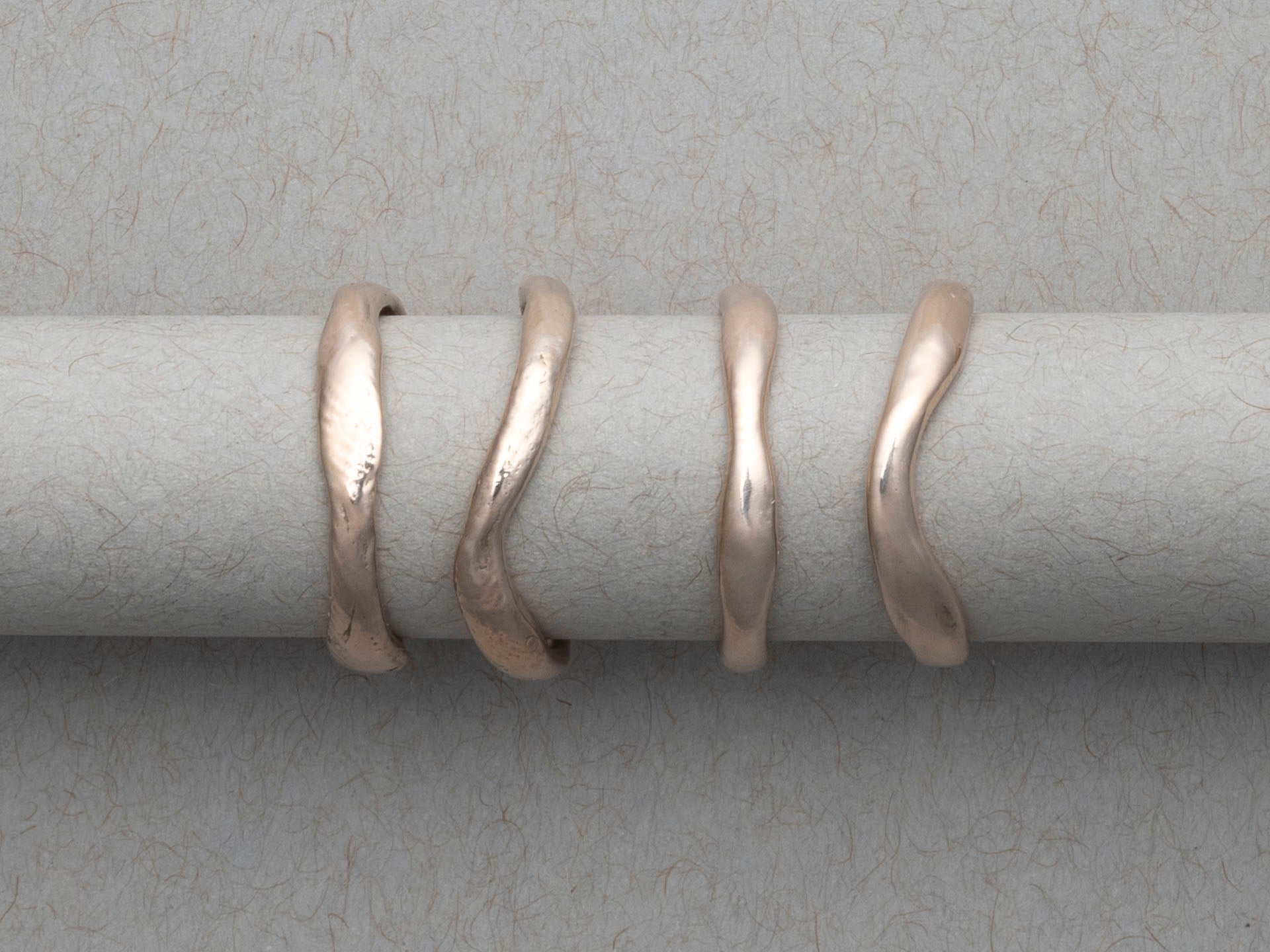Curved and sculptural gold wedding bands made in Providence Rhode Island