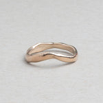 Curved sculptural 14k gold wedding band by RA HA Jewelry