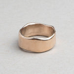 Substantial sculptural gold wedding band designed for everyday wear