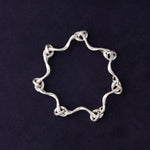 RA HA cast-link chain bracelet in sterling silver from the Continuum collection, front view