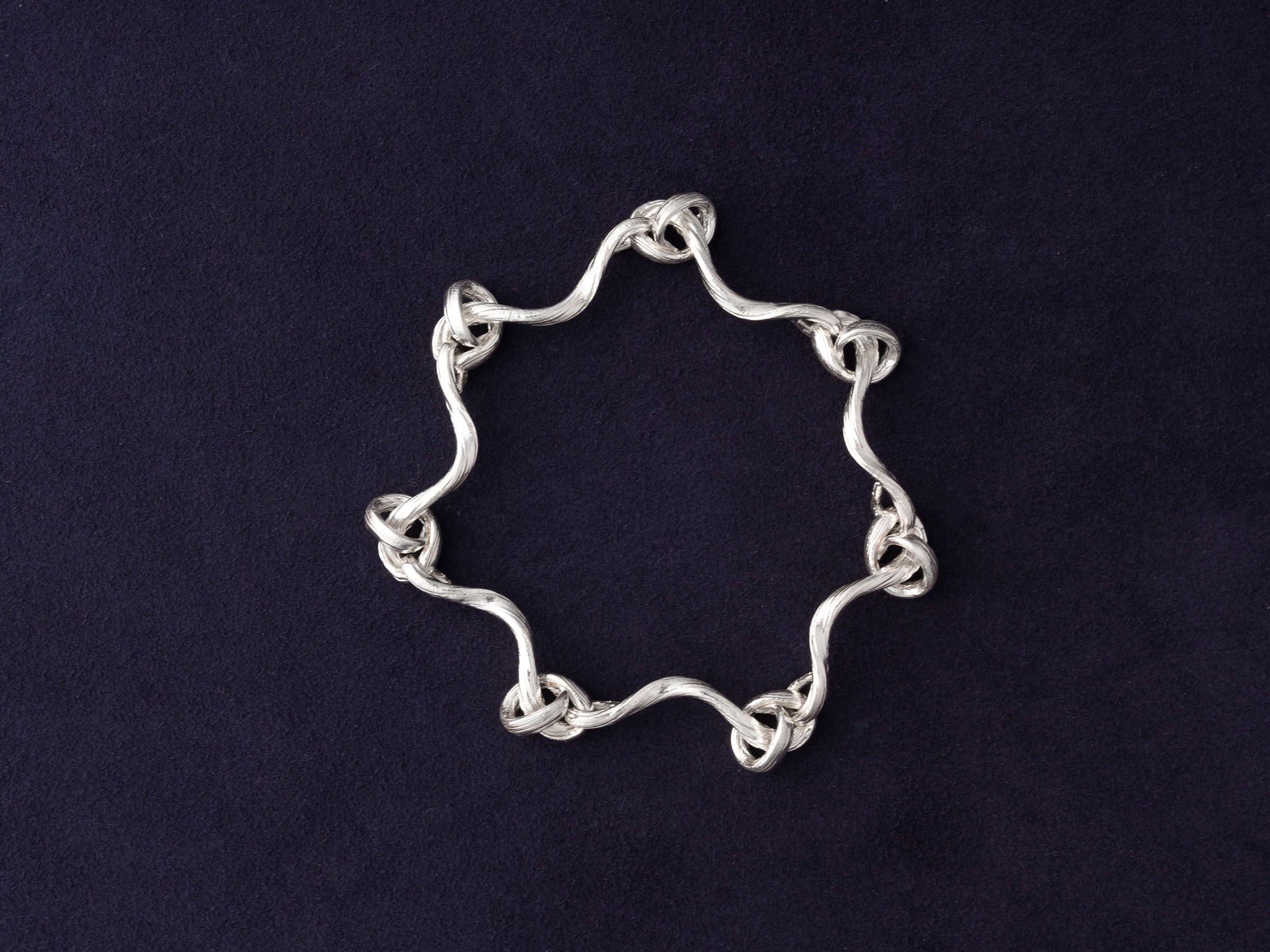 RA HA cast-link chain bracelet in sterling silver from the Continuum collection, front view