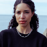 RA HA cast-link chain necklace in sterling silver, worn on body