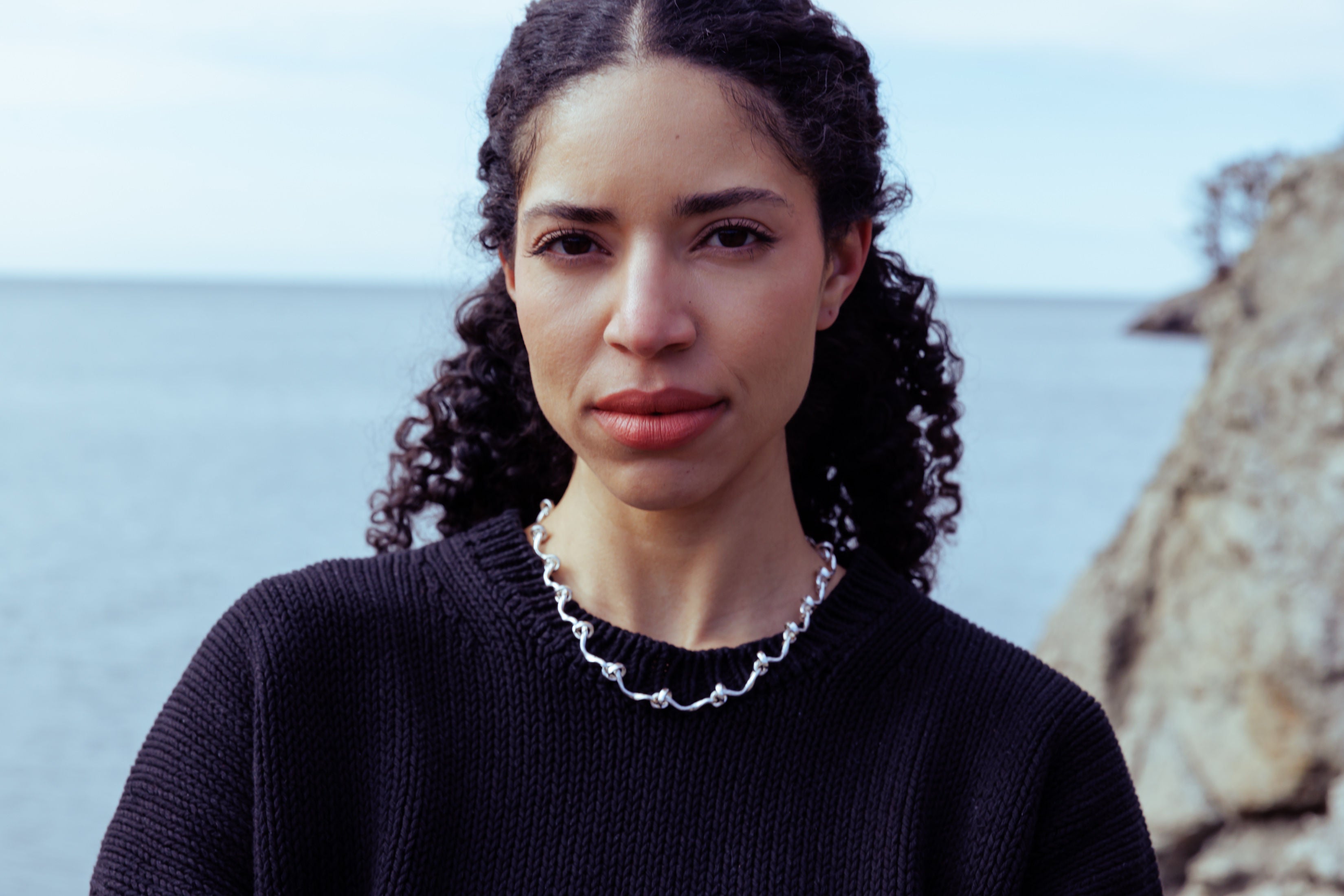 RA HA cast-link chain necklace in sterling silver, worn on body