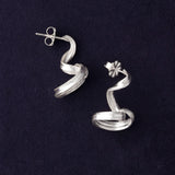 RA HA long sculptural earring in sterling silver from the Continuum collection, front view