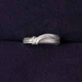RA HA narrow sculptural ring in sterling silver from the Continuum collection, front view