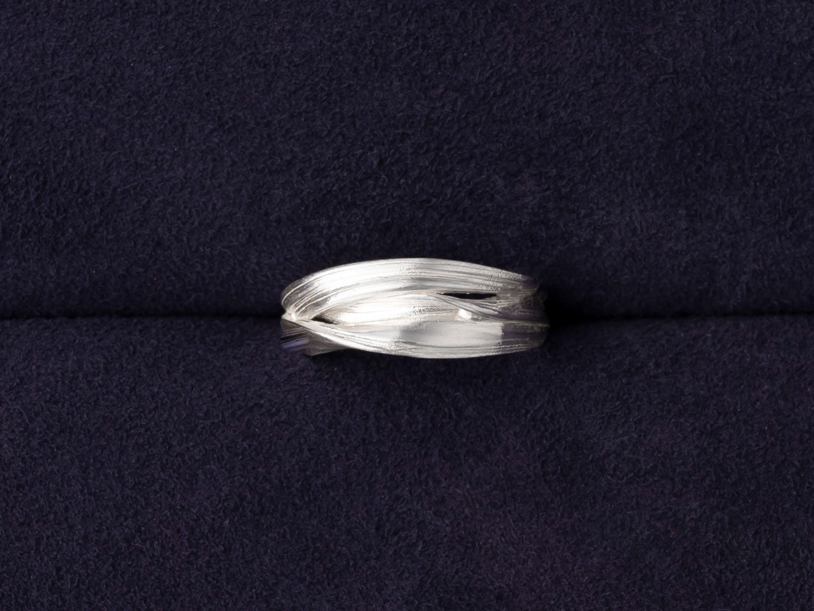 RA HA sculptural ring in sterling silver from the Continuum collection, front view