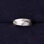 RA HA sculptural ring in sterling silver from the Continuum collection, front view
