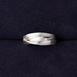 RA HA sculptural ring in sterling silver from the Continuum collection, front view