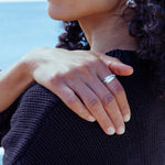 RA HA sculptural ring in sterling silver, worn on hand