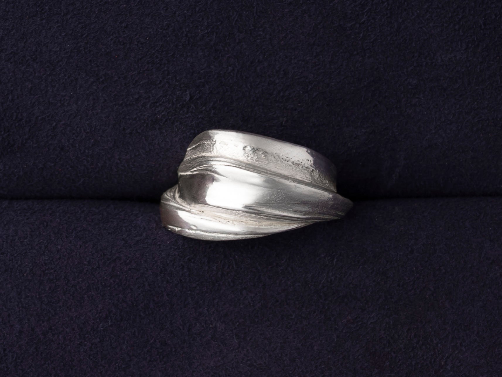 RA HA wide sculptural ring in sterling silver from the Continuum collection, front view