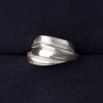 RA HA wide sculptural ring in sterling silver from the Continuum collection, front view