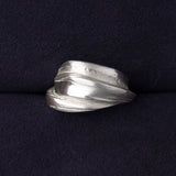 RA HA wide sculptural ring in sterling silver from the Continuum collection, front view