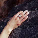 RA HA wide sculptural ring in sterling silver, worn on hand