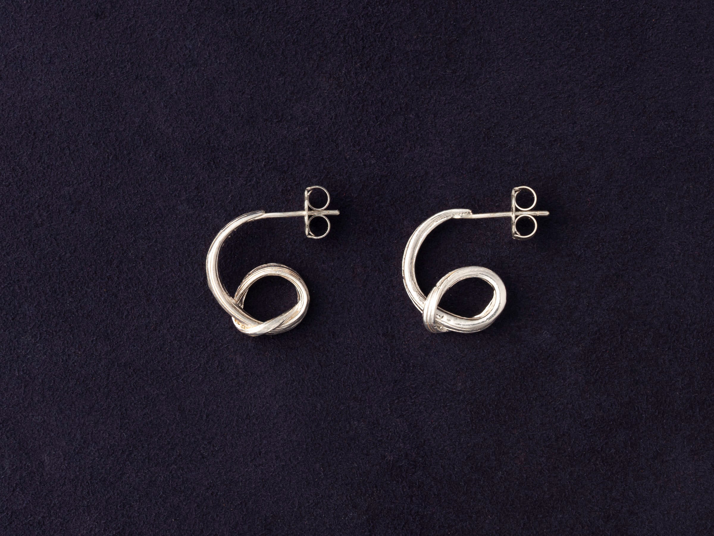 RA HA sculptural hoop earrings in sterling silver from the Continuum collection, Side profile