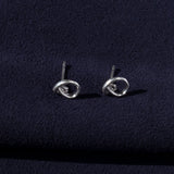 RA HA sculptural stud earrings in sterling silver from the Continuum collection, side view