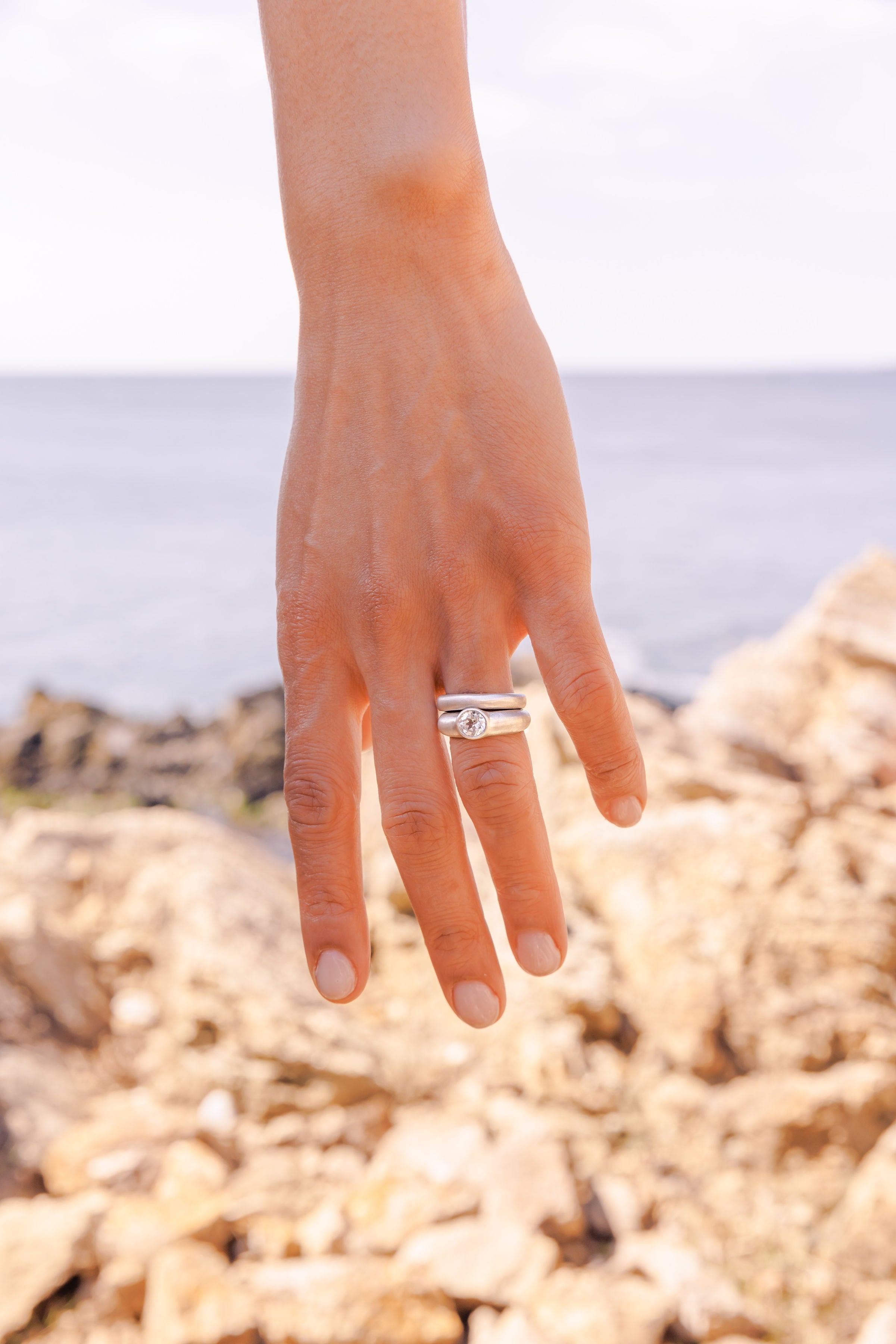 RA HA heirloom ring, worn on hand with stacked bands