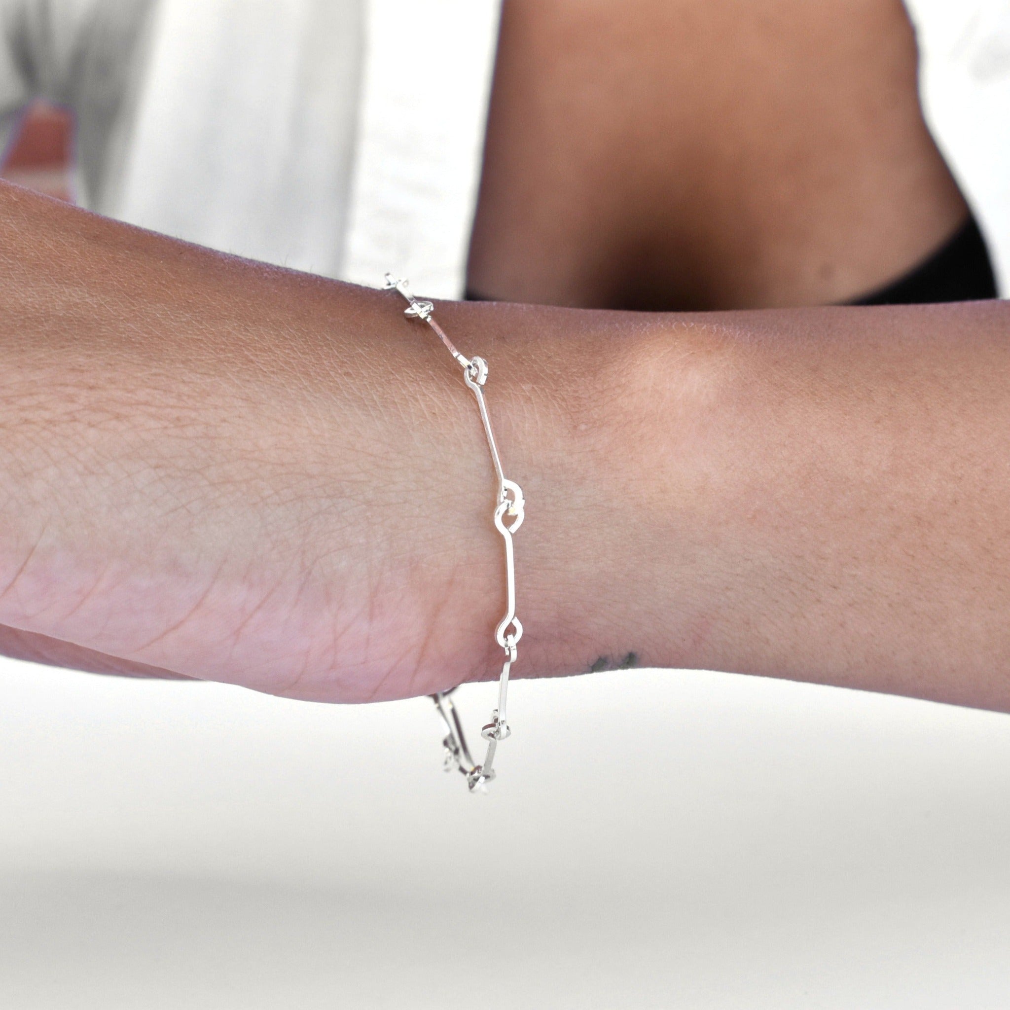 sterling silver handmade chain Bar Bracelet on model with white background
