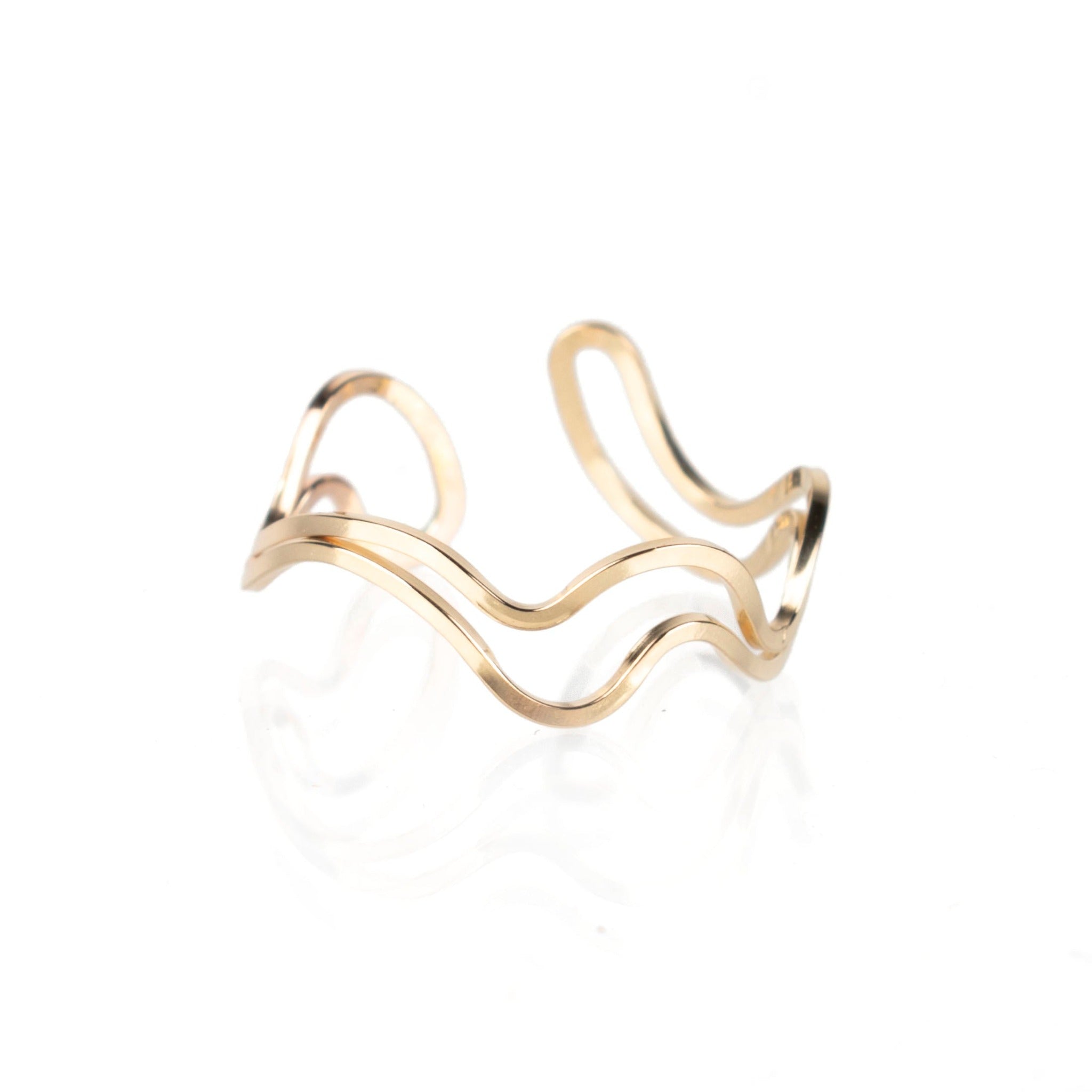 handmade 14k gold fill wave shaped ring on white background
